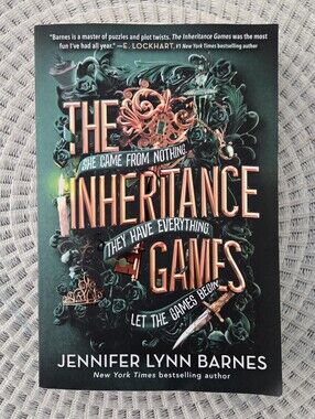 The Inheritance Games by Jennifer Lynn Barnes - Green Cover Paperback